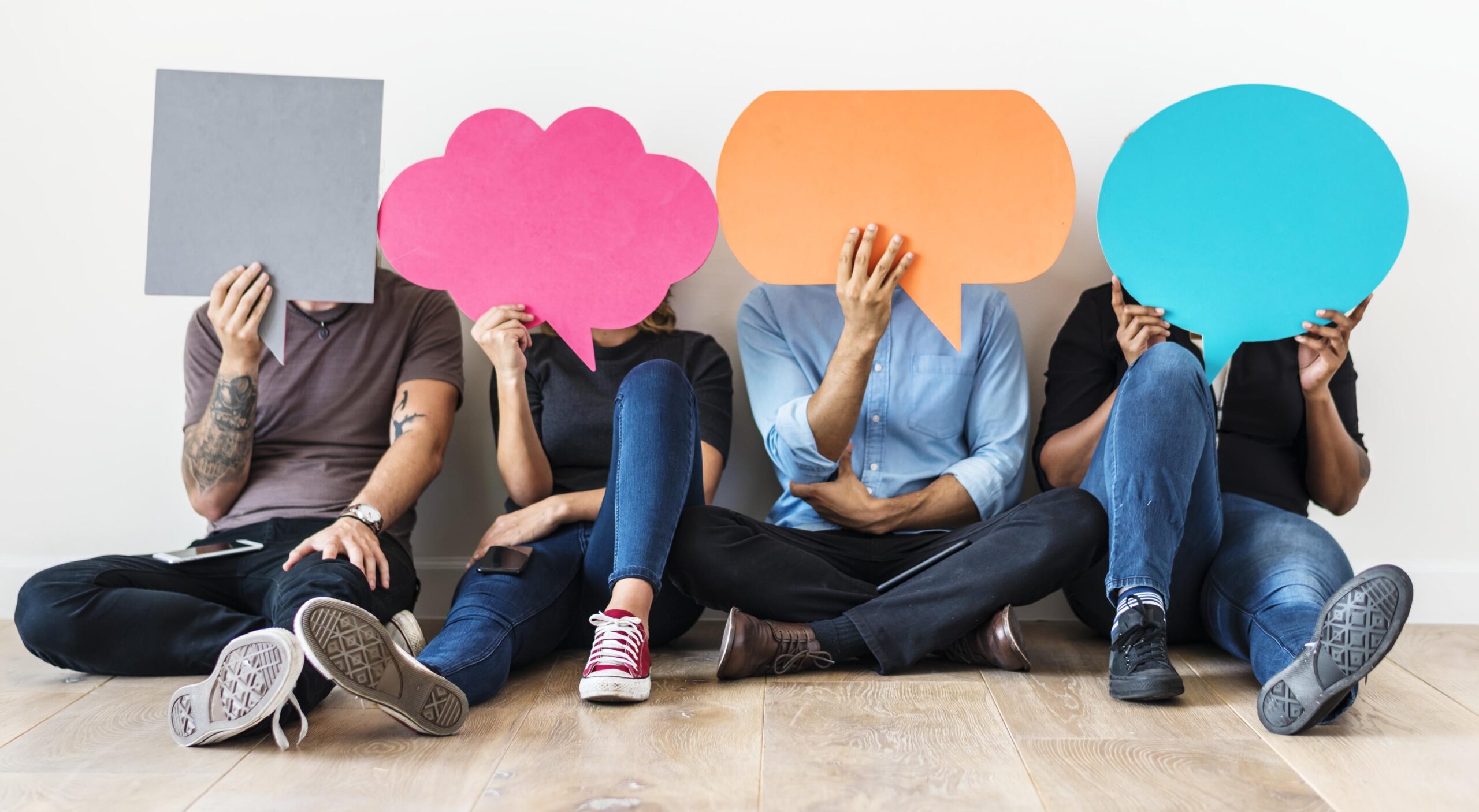 people carryng speech bubble icons The Rise of Conversational Marketing in 2024